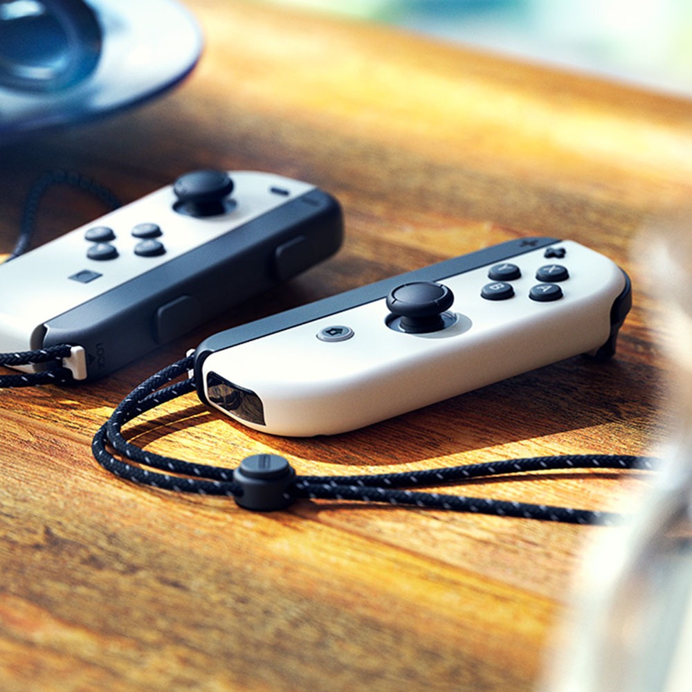 Купить Игровая приставка Nintendo Switch OLED белый (Japan spec) в Москве